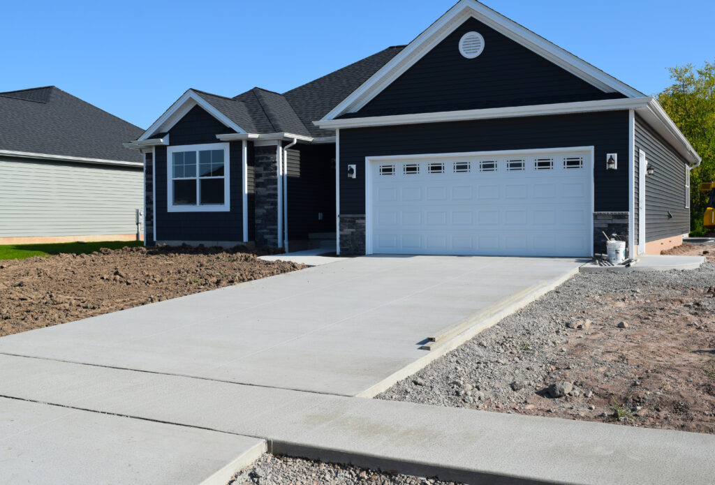 A newly constructed concrete driveway